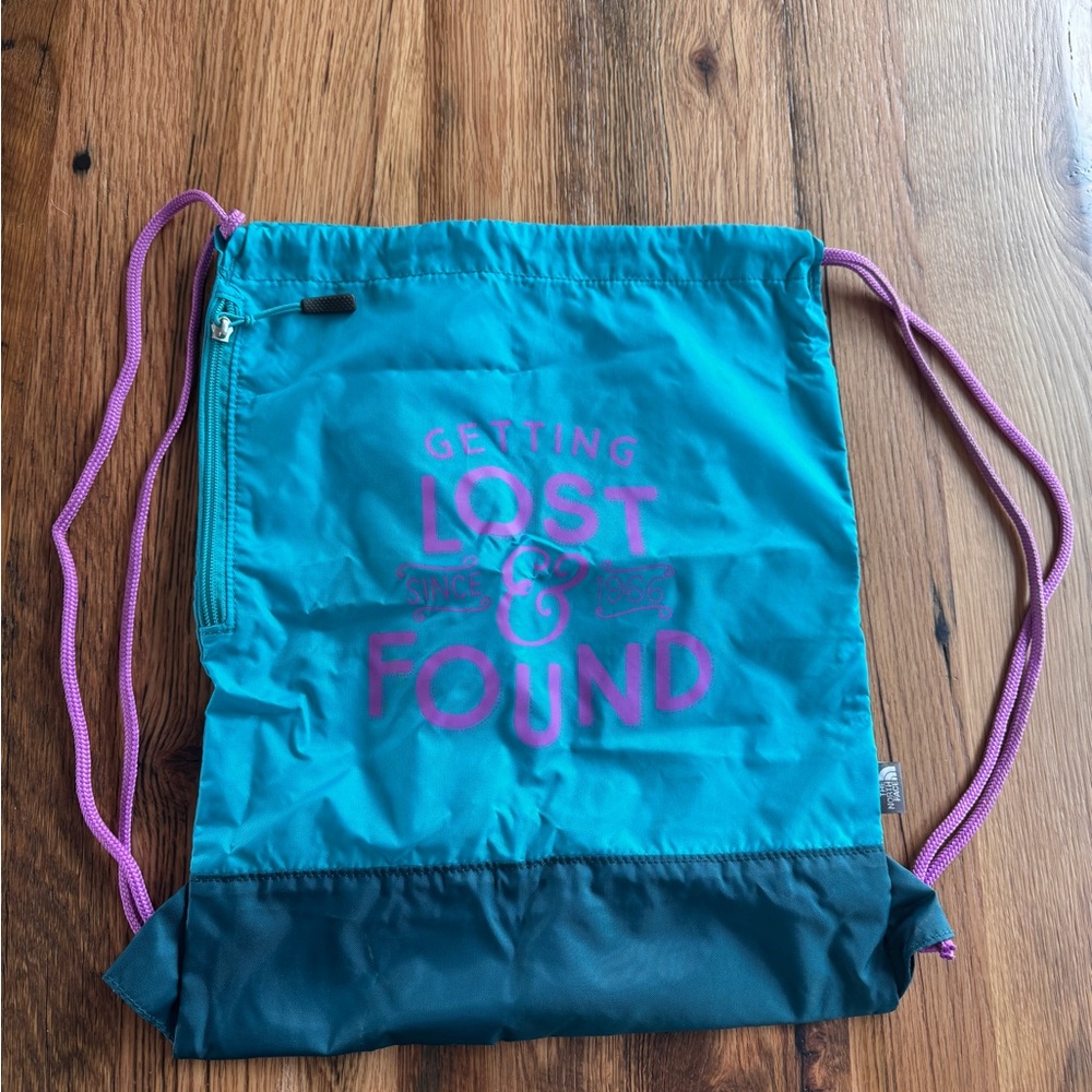 The North Face Blue and Pink Backpack Lightweight Drawstring Design